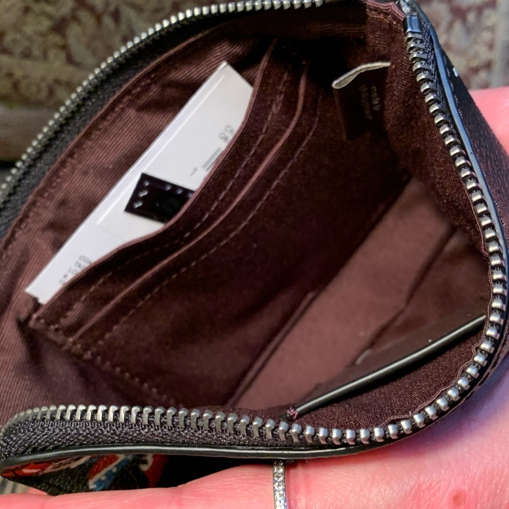 Authentic COACH Signature Coated leather Disney Xmas  print zip top wristlet - Picture 7 of 16